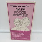 Vintage Rs Realistic Am Fm Solid State Pocket Hand Held Radio 12-609A Works. Fixed Price $42.99.