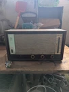 Zenith Vintage Solid State Fm Am Long Distance Radio B922Z Wood Case. Fixed Price $50.00.