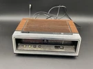 Ge Walnut Grain Finish Alarm Clock Radio Model #7-4650K Tested. Fixed Price $21.59.