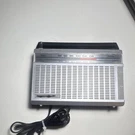 General Electric 7-2501A Fm/am Radio Portable Silver Black Two Way Power. Fixed Price $25.00.