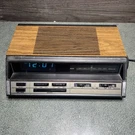 General Electric 7-4666A Alarm Clock Am Fm Radio Wood Grain Works Vintage. Fixed Price $49.99.