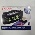 Sharp SPC618AGAMZ Digital Alarm Clock Am/fm Radio Dual Aux-in Green Led. Fixed Price $28.00.