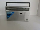 Vintage General Electric Portable Am/fm Radio Model 7-2660C Works. Fixed Price $45.00.