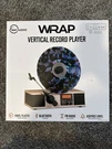 Fuse Wrap Vertical Vinyl Record Player Radio, Bluetooth, Alarm Clock - Bamboo. Fixed Price $119.99.