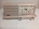 Vintage General Electric C-422C Musaphonic Am Tube Clock Radio Pink For Parts. Fixed Price $34.99.