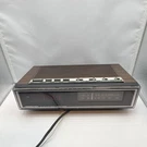Soundesign 3691-(B) Vintage Digital Am/fm Clock Radio Brown Black 1978 Alarm. Fixed Price $30.00.