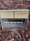 Vintage Windsor Am/fm Electronic Clock Radio Model KR-2400 W/ Outlet Nib. Fixed Price $40.00.