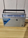 General Electric 7-2660B Am/fm Portable Radio, 2-WAY Power, Silver. Fixed Price $19.99.