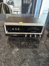Zenith F472W-3 Circle Of Sound Flip Clock Am/fm Radio Woodgrain Works. Fixed Price $25.00.