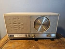 General Electric Radio Model # T238A In Honey Beige Am/fm. Fixed Price $30.00.