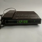 Vintage Magnavox Telephone Clock Radio Combo - Wood Grain Tested And Working. Fixed Price $19.95.