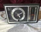 General Electric Analog Am/fm Alarm Clock Radio Brown Woodgrain Rectangle. Fixed Price $34.69.