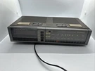 Vintage Lloyd's Am Fm Stereo Radio Alarm Clock Simulated Wood Grain Model J370. Fixed Price $22.99.