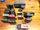16 Vintage Motorola Pagers, Minitor Alert Receivers And Voice Paging Base. Fixed Price $160.00.