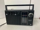 **vintage Realistic Am/fm Portable Radio Model 12-665 By Shack. Fixed Price $27.99.