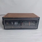 General Electric Flip Clock Radio 7-4303G For Parts Works Broke. Fixed Price $40.00.
