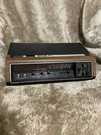 Vintage General Electric Alarm Clock Radio 7-4670F, Walnut Grain. Fixed Price $69.00.