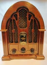 Vintage Wood Replica Of 1932 Cathedral Style Am/fm Radio Model 7-4100JA Works. Fixed Price $50.00.
