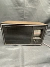 Vintage Solid State Table Radio Model T2210A Walnut Grain Top- Works Great!!. Fixed Price $35.00.