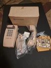 Western Electric Beige 2554 Touch Tone Wall Phone Old Stock. Fixed Price $199.99.