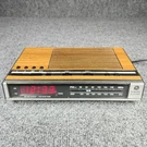 Vintage General Electric 7-4636D Am/fm Radio Alarm Clock Wood Grain Tested. Fixed Price $16.99.