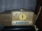 Walnut Brown Mid Century Jetsons 1958 General Electric Model C415 Tube Am Clock. Fixed Price $50.00.