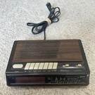 Cosmo Fm/am Clock Radio Digital Alarm Brown Snooze Button 2 Settings. Fixed Price $16.00.