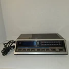 General Electric 7-4663A Vintage Am Fm Dual Alarm Clock Radio Woodgrain Blue. Fixed Price $39.95.