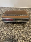 Vtg General Electric Alarm Clock Am/fm Radio 7-4625C Wood Grain Works. Fixed Price $28.00.