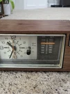 Vintage General Electric 7-4550C Walnut Grain As Is Clock Radio Works. Fixed Price $50.00.