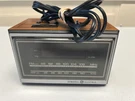 General Electric 285A-1942 Radio Alarm Clock Woodgrain Am/fm Works Tested. Fixed Price $29.95.