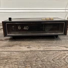Vintage Lloyds Am Fm Radio Alarm Flip Clock Model IJ61G-131A. Fixed Price $40.00.