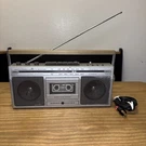 Vintage General Electric 3-5284A Am/fm Stereo Cassette Boom Box Radio. Fixed Price $49.90.