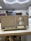 General Electric Early Radio Model # T238B In Honey Beige Am/fm Works-hums. Fixed Price $28.49.