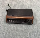 Vintage General Electric Model 7-4670F Am/fm Clock Radio Woodgrain. Fixed Price $25.00.