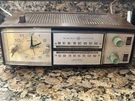 Vintage General Electric Radio Alarm Clock Solid State Woodgrain Analog Video. Fixed Price $74.99.