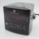General Electric Am/fm Alarm Clock Radio Cube Battery Backup 7-4808A Works. Fixed Price $14.95.