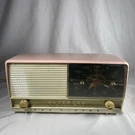 Powder Pink 1956 Rca Victor Model 8-C-7FE Vacuum Tube Am Clock Radio. Fixed Price $199.97.