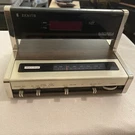 Vintage Zenith Radio Billboard J465W Electronic Alarm Clock Wood Grain. Fixed Price $101.69.