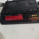Gran Prix Am/fm Clock Radio Black With Dial. Fixed Price $18.00.