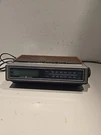 Vintage General Electric 7-4655A Am/fm Alarm Clock Radio Wood Grain (tested). Fixed Price $14.00.