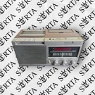 *semi-working* General Electric Rosewood Grain Cassette Alarm Clock 7-4905A. Fixed Price $24.98.