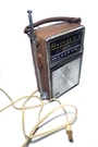 Vintage Am/fm Radio P977E Portable Brown Leather Battery & 120AC Oe Manual. Fixed Price $29.50.