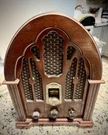 Used, Ge Cathedral Am/fm Radio Wood Reproduction Model No 7-4100JA. Fixed Price $70.00.