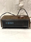 Vtg Panasonic Alarm Clock Am/fm Radio Model RC-75 Plastic Wood Grain Works Is. Fixed Price $24.99.