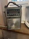 Vintage General Electric Am Fm Radio Model P977E Brown Cover Portable. Fixed Price $50.00.