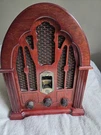 General Electric Reproduction Model No 7-4100JA Cathedral Am/fm Radio Wood. Fixed Price $44.99.