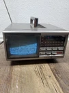 L84 Vintage General Electric 5" & W Portable Tv Am/fm Radio Model 7-7150A. Fixed Price $39.99.