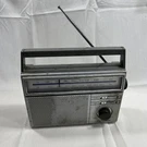 Realistic Model 12-717 Portable Silver Am Fm Radio Vintage As Untested Parts. Fixed Price $6.99.