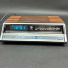 Vtg General Electric 7-4662B Am/fm Alarm Clock Radio Wood Grain Works. Fixed Price $49.88.